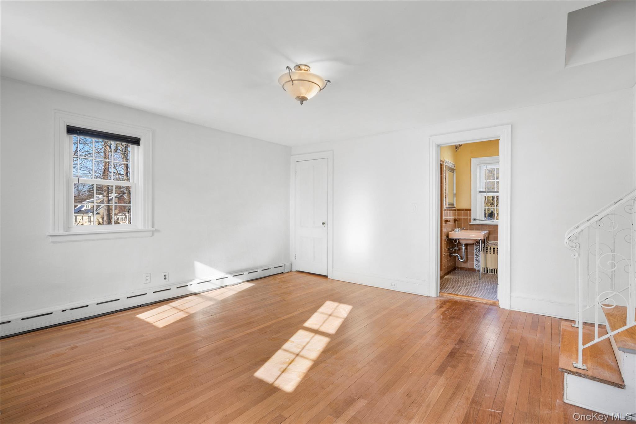 1146 North Avenue New Rochelle, NY 10804 - Photo 31 of 50 a view of empty room with wooden floor and fan