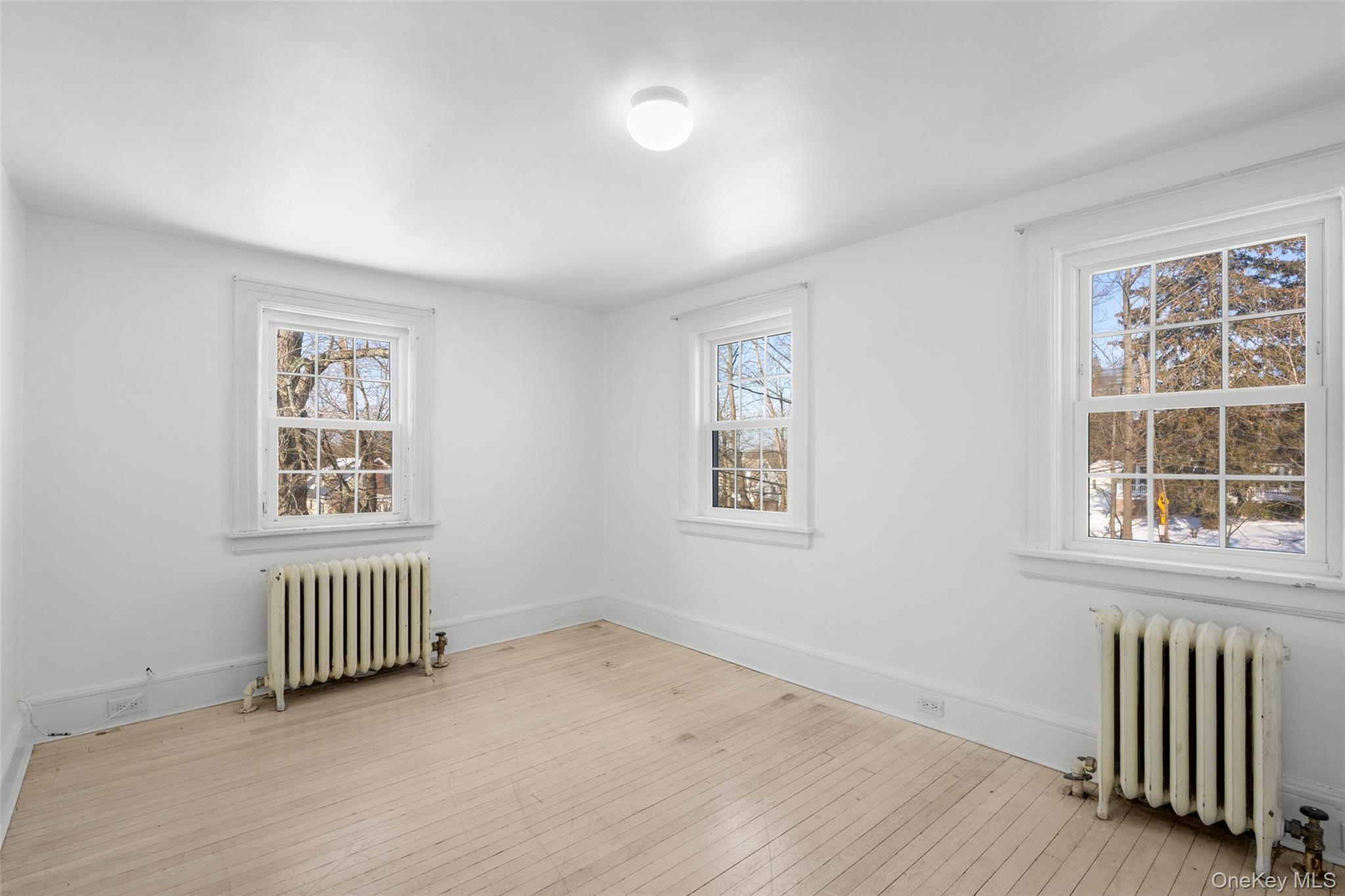 1146 North Avenue New Rochelle, NY 10804 - Photo 35 of 50 an empty room with windows