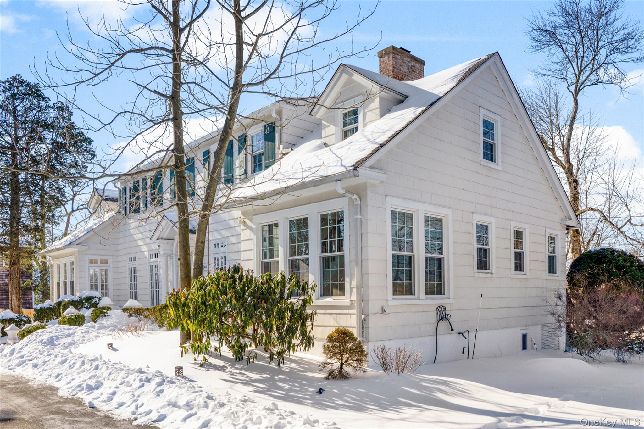 1146 North Avenue New Rochelle, NY 10804 - Photo 4 of 50 a front view of a house with a yard