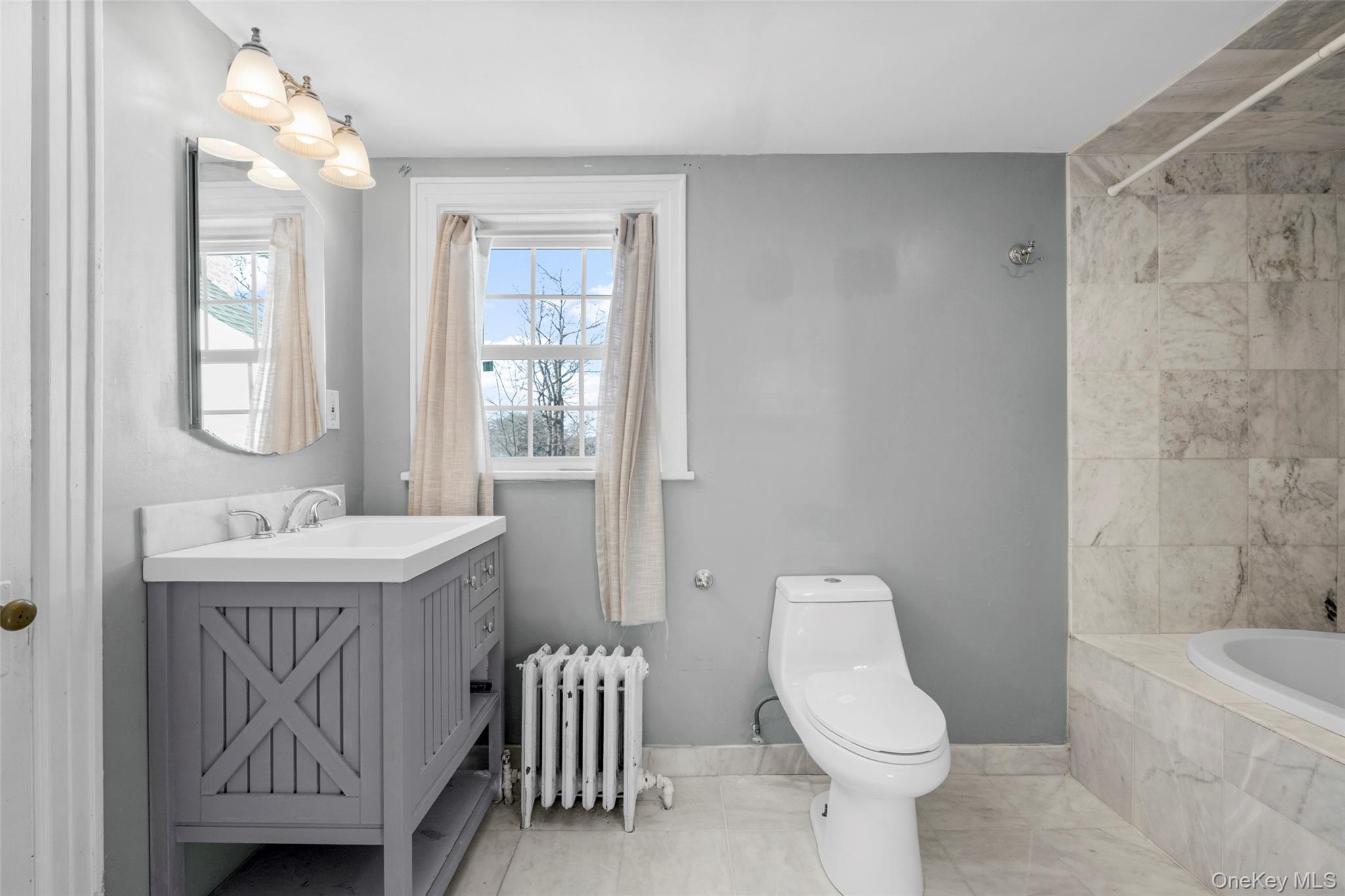 1146 North Avenue New Rochelle, NY 10804 - Photo 41 of 50 a bathroom with a sink toilet and shower