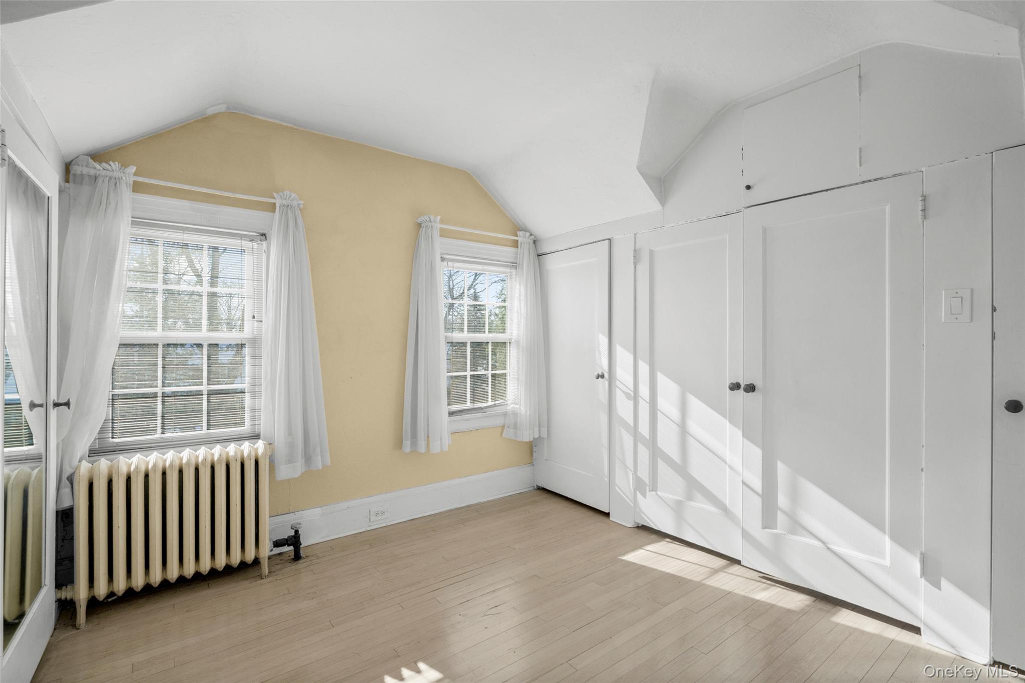 1146 North Avenue New Rochelle, NY 10804 - Photo 44 of 50 a view of an empty room with a window