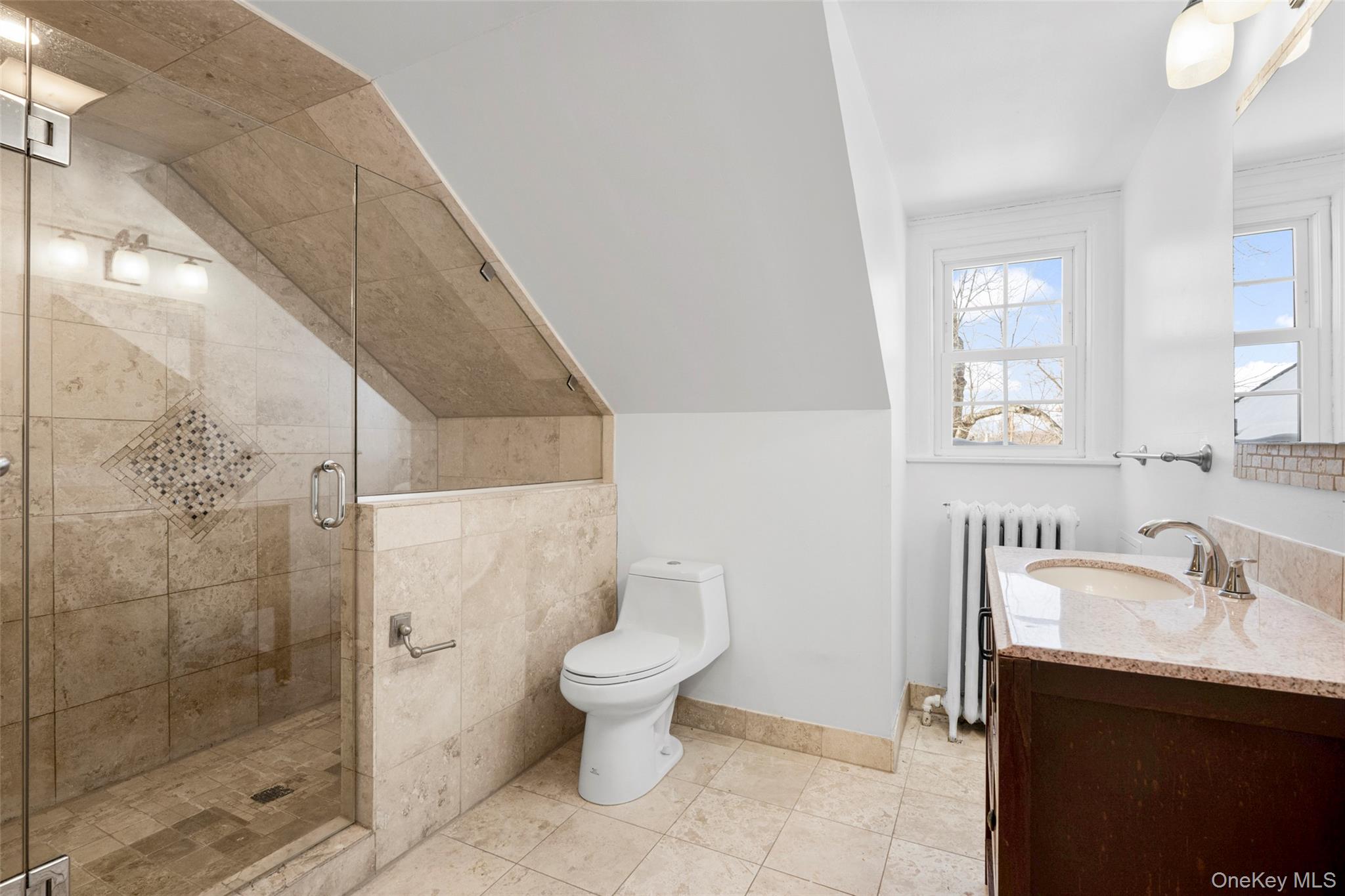 1146 North Avenue New Rochelle, NY 10804 - Photo 47 of 50 a bathroom with a toilet sink and shower