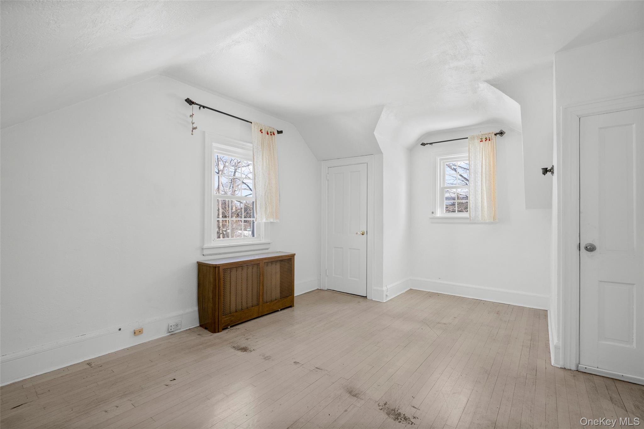 1146 North Avenue New Rochelle, NY 10804 - Photo 49 of 50 an empty room with a window