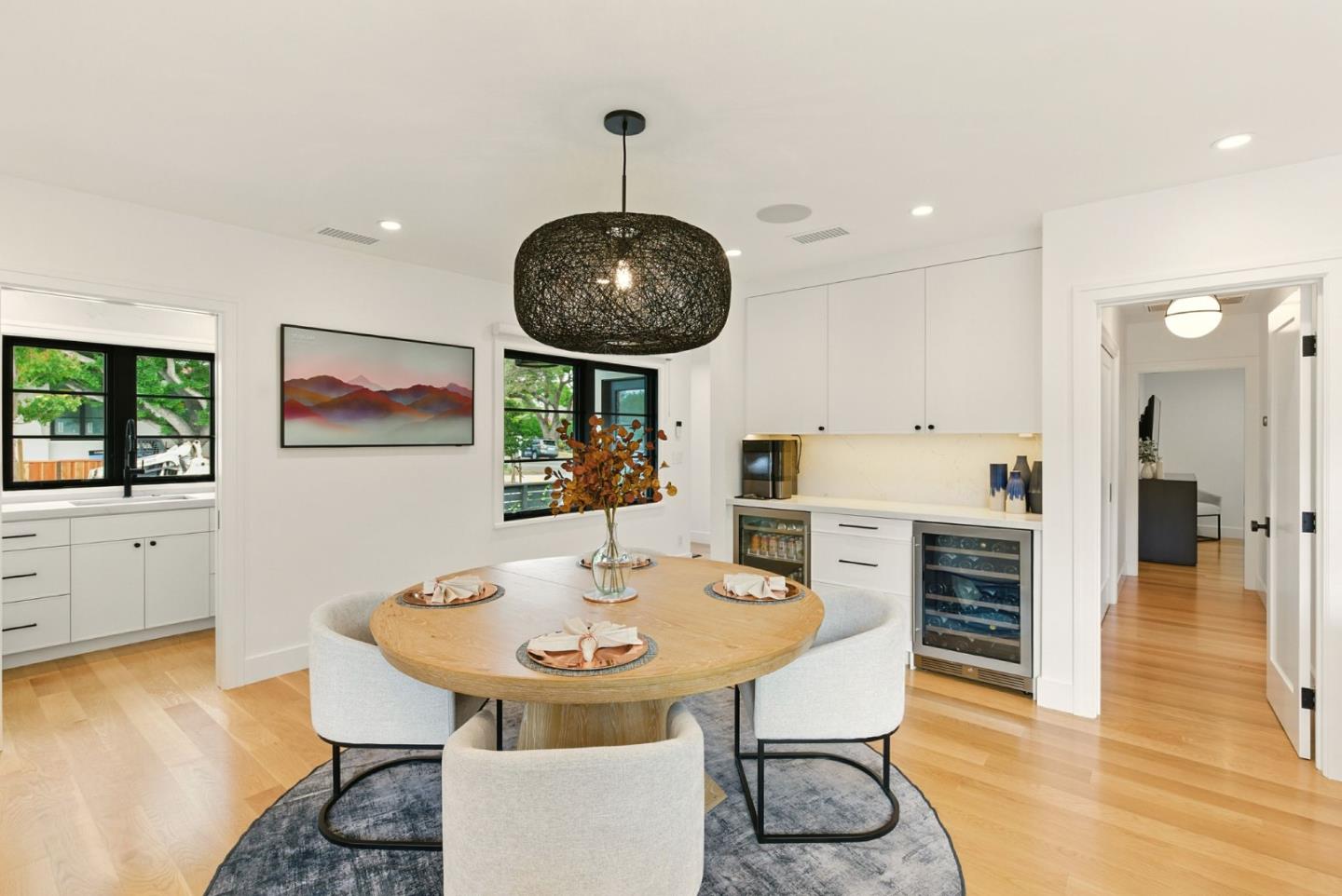 240 Bancroft Road Burlingame, CA 94010 - Photo 11 of 41 a view of a dining room with furniture and wooden floor