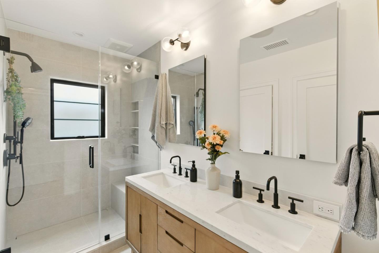 240 Bancroft Road Burlingame, CA 94010 - Photo 16 of 41 a bathroom with a sink vanity granite tub and shower