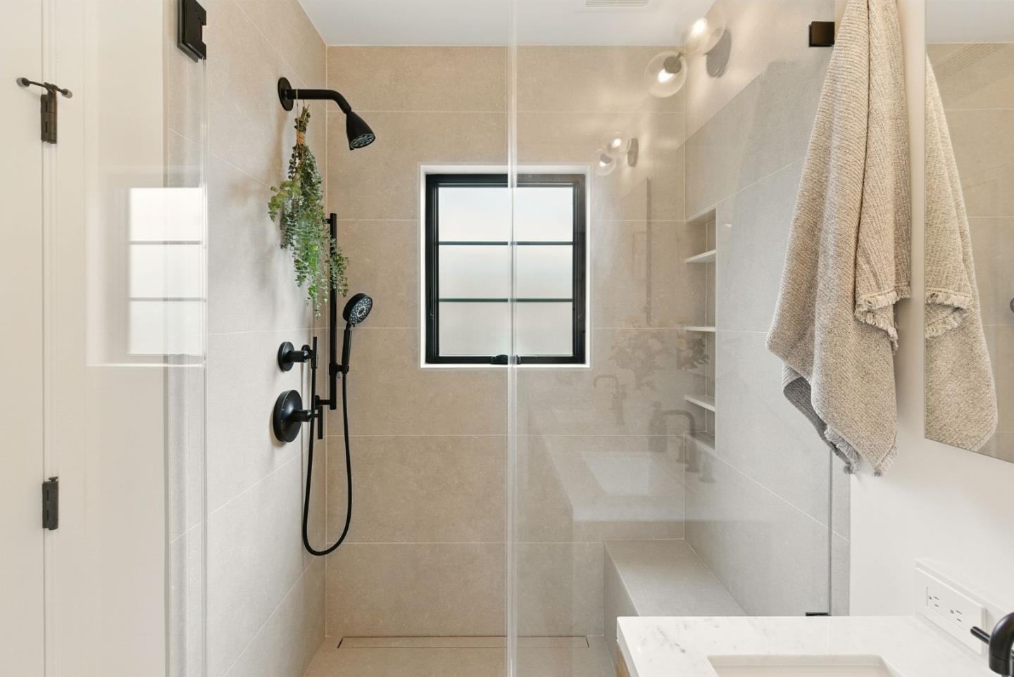 240 Bancroft Road Burlingame, CA 94010 - Photo 17 of 41 a bathroom with a shower and a tub