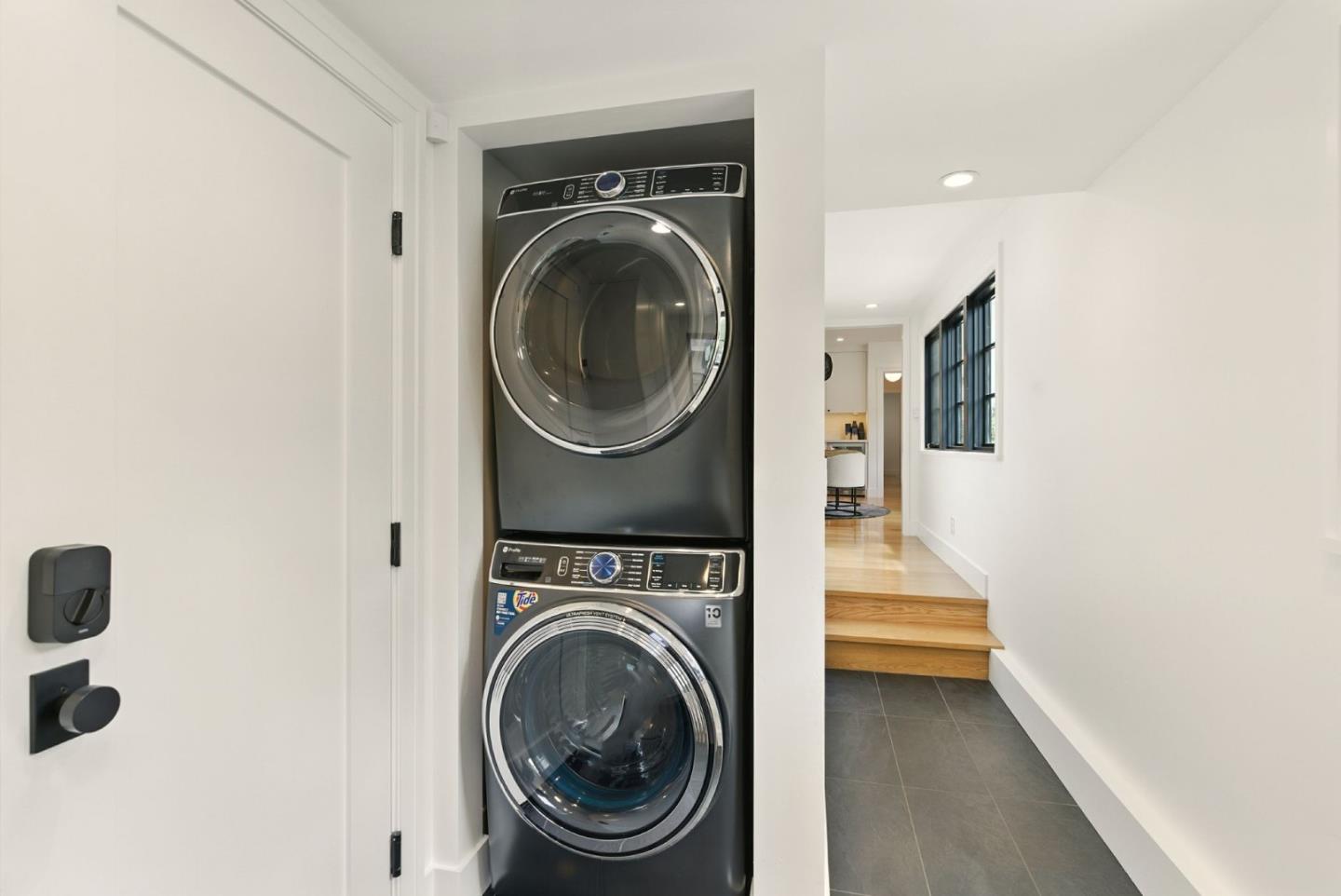 240 Bancroft Road Burlingame, CA 94010 - Photo 26 of 41 a view of a storage & utility room with dryer and washer