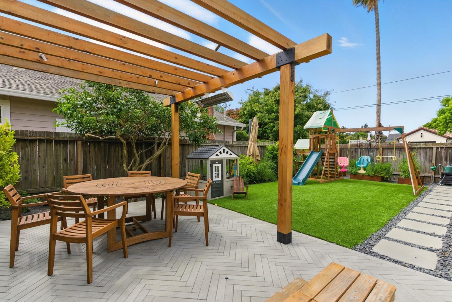 240 Bancroft Road Burlingame, CA 94010 - Photo 29 of 41 a patio with table and chairs