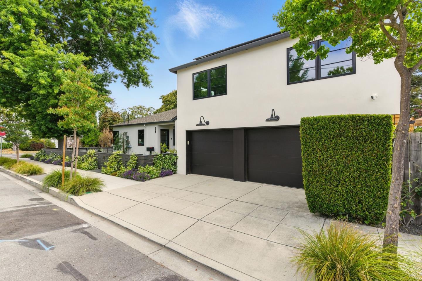 240 Bancroft Road Burlingame, CA 94010 - Photo 3 of 41 a front view of a house with garden