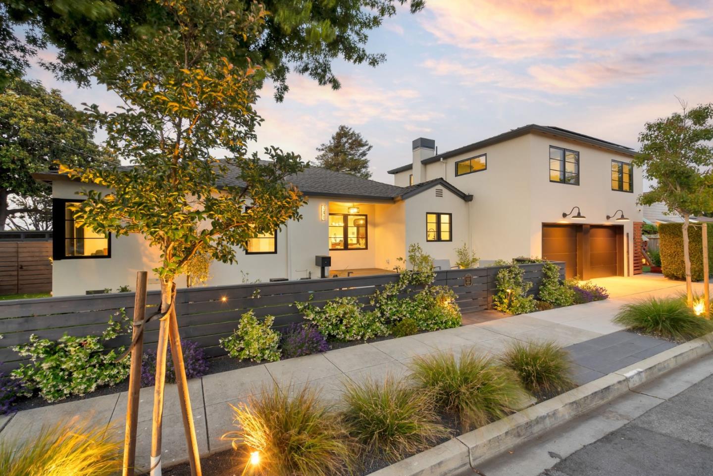 240 Bancroft Road Burlingame, CA 94010 - Photo 32 of 41 a front view of a house with a yard