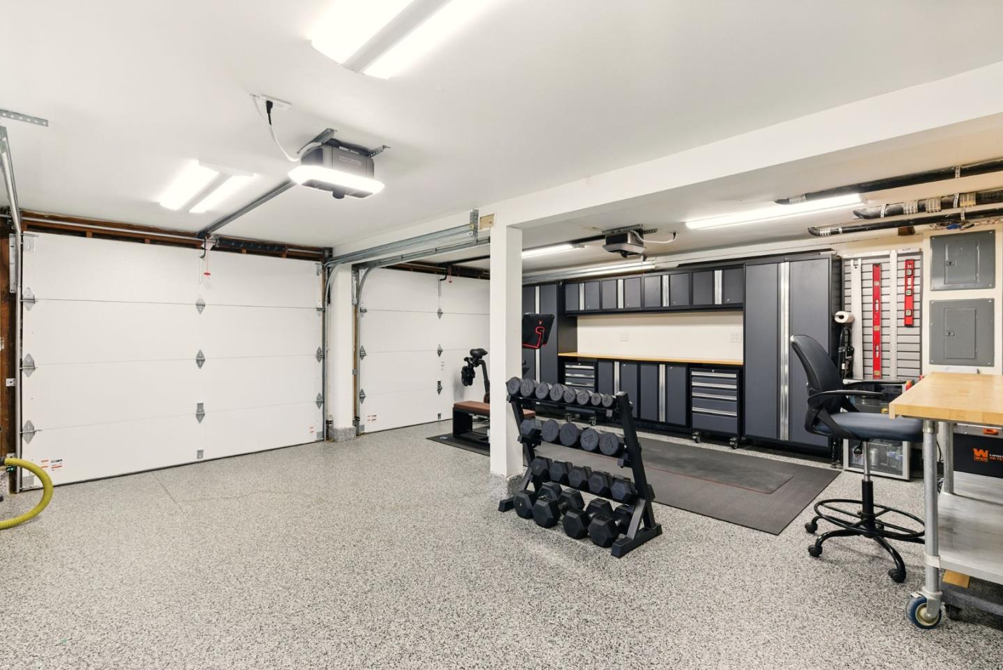 240 Bancroft Road Burlingame, CA 94010 - Photo 33 of 41 a view of a livingroom with workspace and windows
