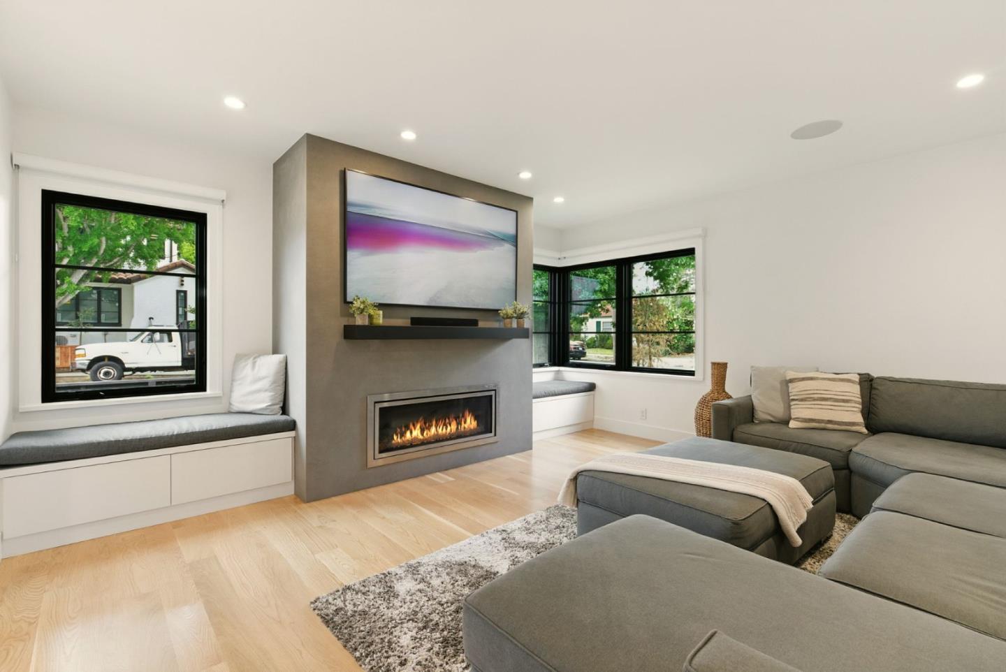 240 Bancroft Road Burlingame, CA 94010 - Photo 5 of 41 a living room with furniture and a flat screen tv