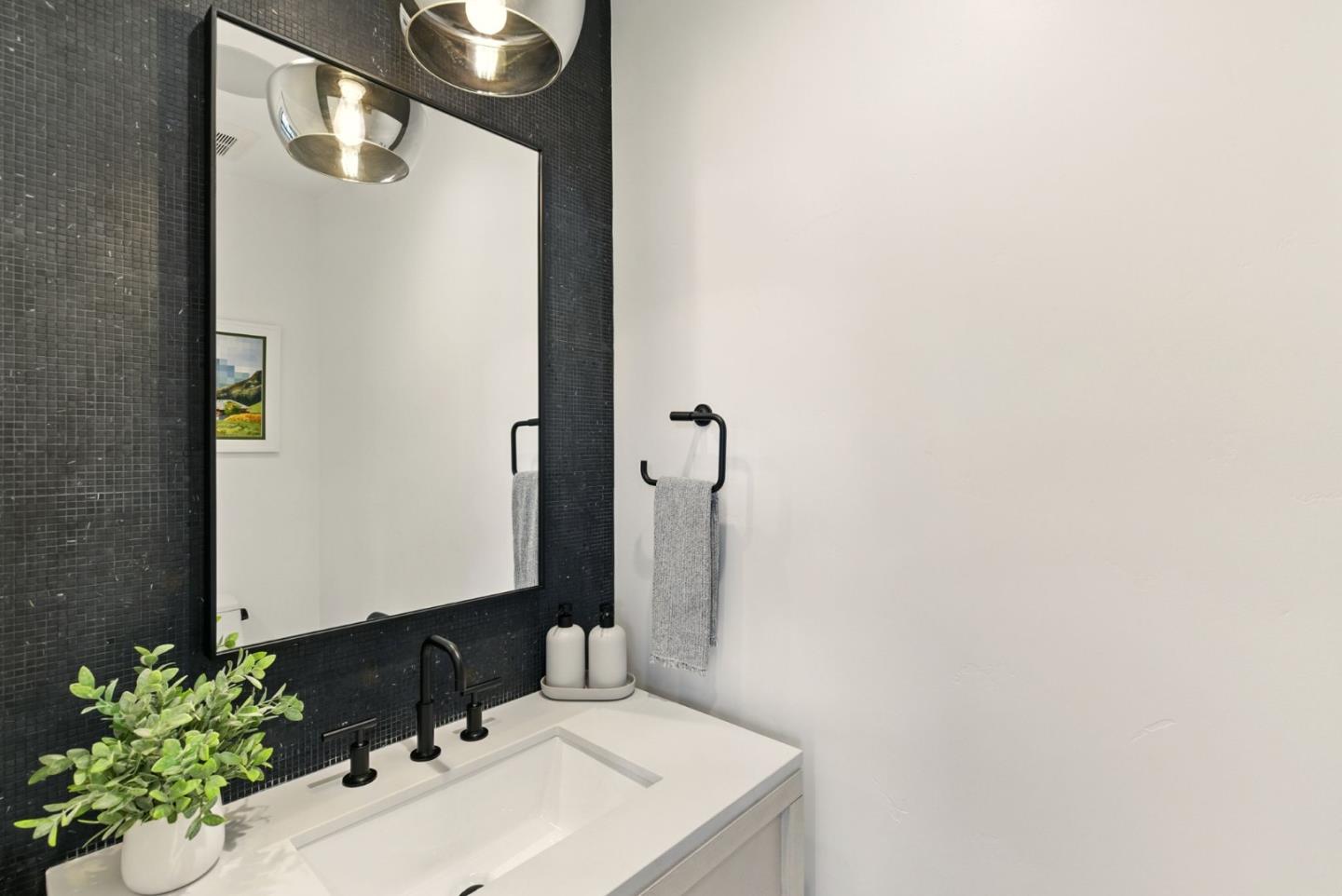 240 Bancroft Road Burlingame, CA 94010 - Photo 7 of 41 a bathroom with a sink and a mirror