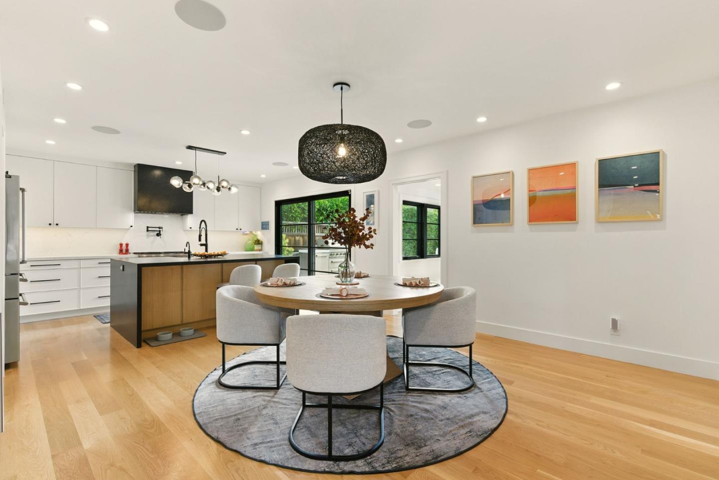 240 Bancroft Road Burlingame, CA 94010 - Photo 9 of 41 a kitchen with a table and chairs