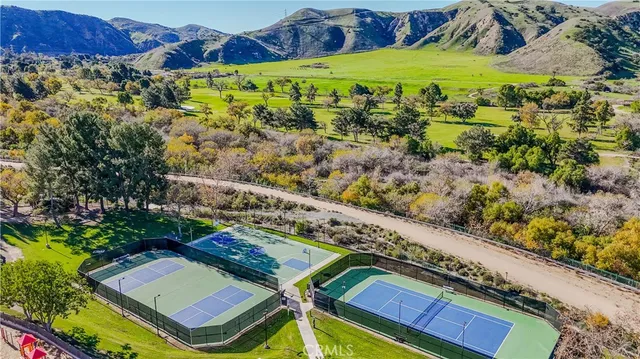 a view of a yard with an outdoor space