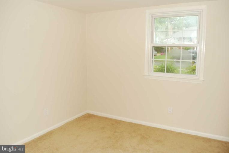 1904 Old Stage Road Alexandria, VA 22308 - Photo 14 of 21 an empty room with a window