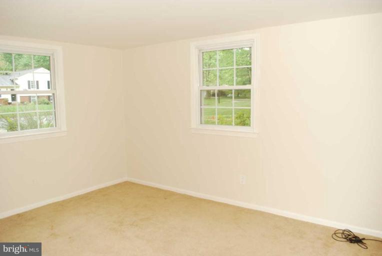 1904 Old Stage Road Alexandria, VA 22308 - Photo 15 of 21 an empty room with a window