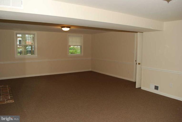 1904 Old Stage Road Alexandria, VA 22308 - Photo 9 of 21 an empty room with windows