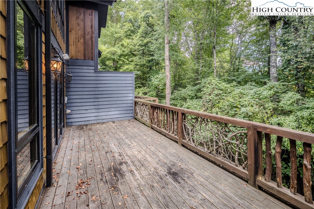 161 Hump View Trail Banner Elk, NC 28604 - Photo 15 of 50 a view of a balcony with trees