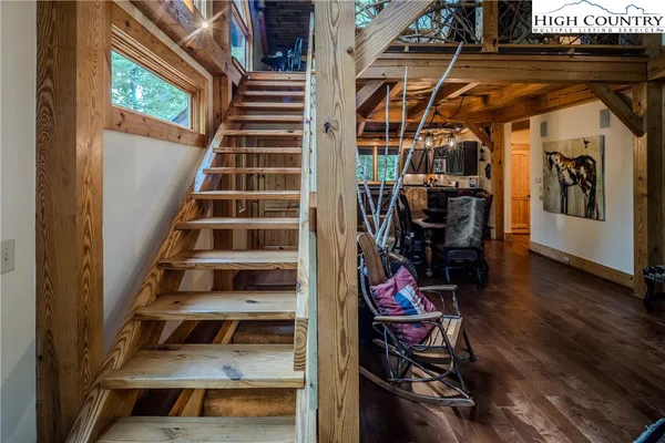 a view of a room with lots of gym equipment
