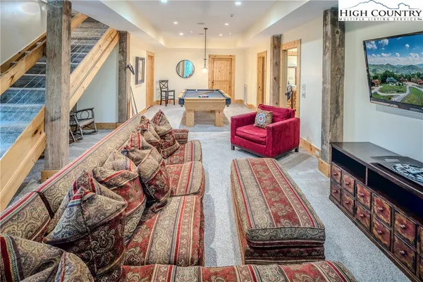 a living room with furniture and a table