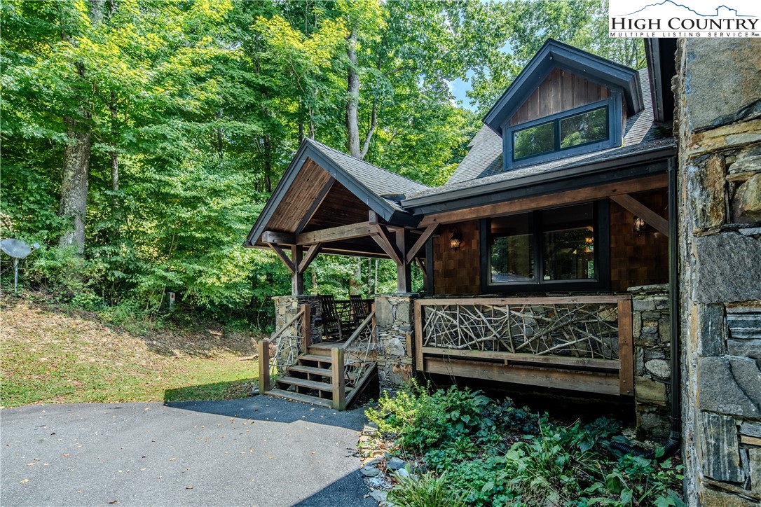161 Hump View Trail Banner Elk, NC 28604 - Photo 28 of 50 a view of outdoor space yard and porch