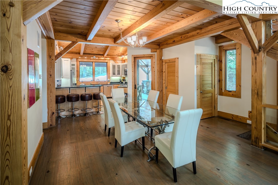 161 Hump View Trail Banner Elk, NC 28604 - Photo 31 of 50 a view of a dining room with furniture and wooden floor
