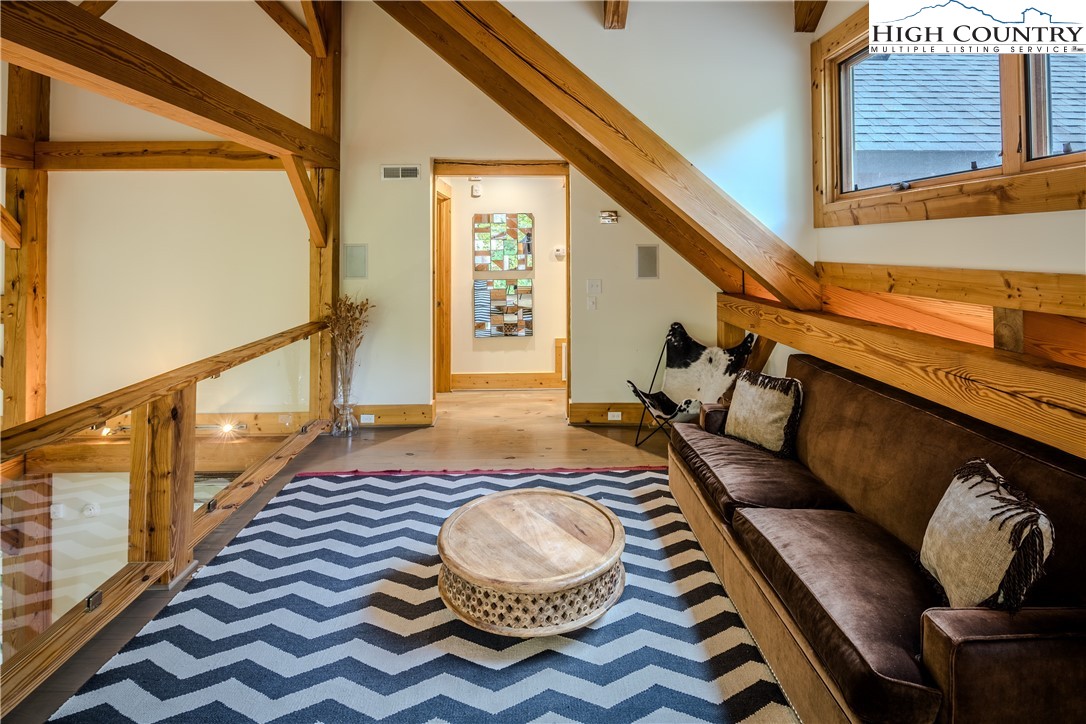 161 Hump View Trail Banner Elk, NC 28604 - Photo 39 of 50 a living room with furniture and a rug