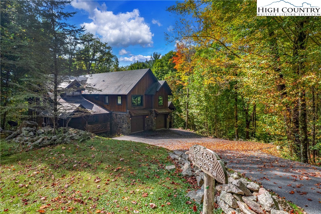 161 Hump View Trail Banner Elk, NC 28604 - Photo 5 of 50 a view of house with yard