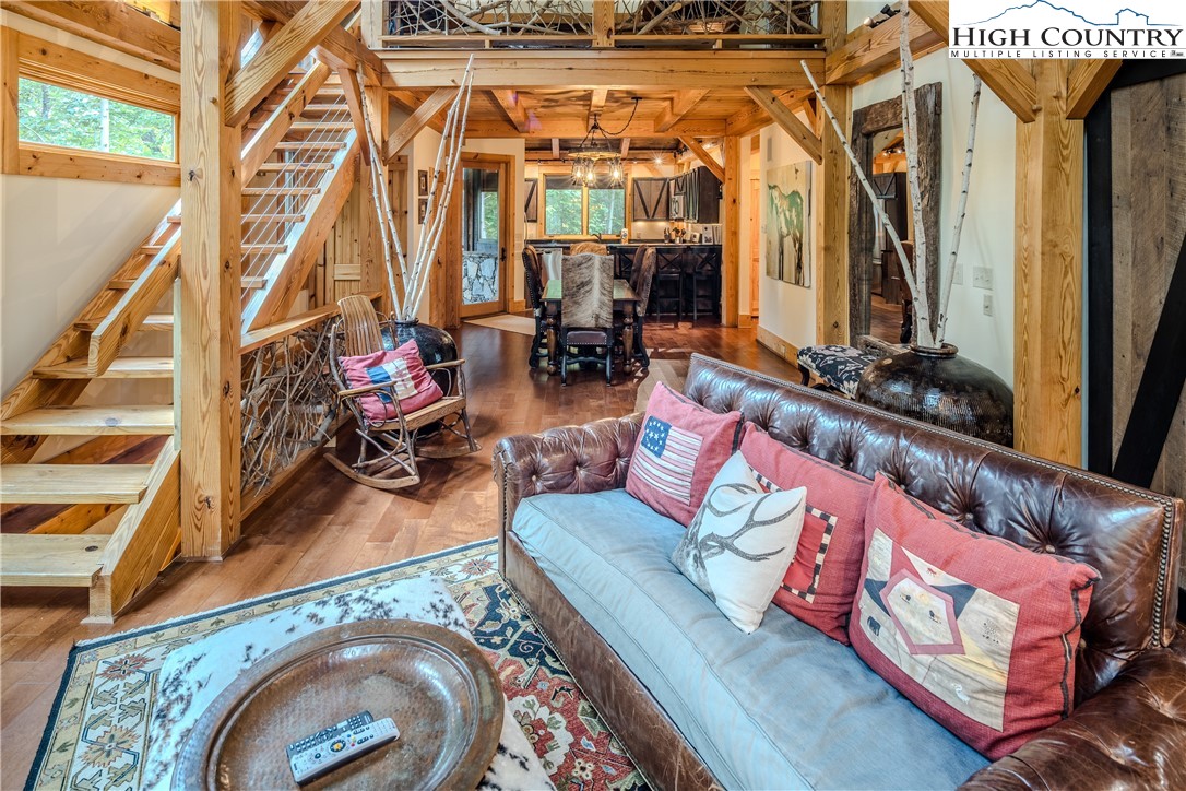 161 Hump View Trail Banner Elk, NC 28604 - Photo 8 of 50 a living room with furniture and a wooden floor