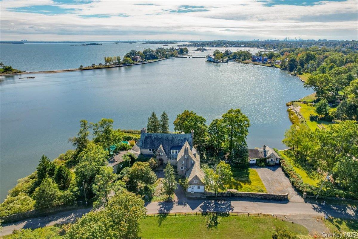 1 Pryer Manor Road Larchmont, NY 10538 - Photo 2 of 12 a view of a lake with a outdoor space