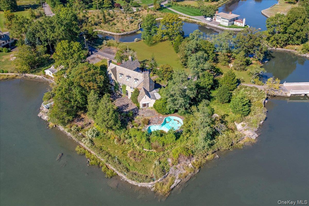 1 Pryer Manor Road Larchmont, NY 10538 - Photo 5 of 12 an aerial view of a house with a yard and lake view