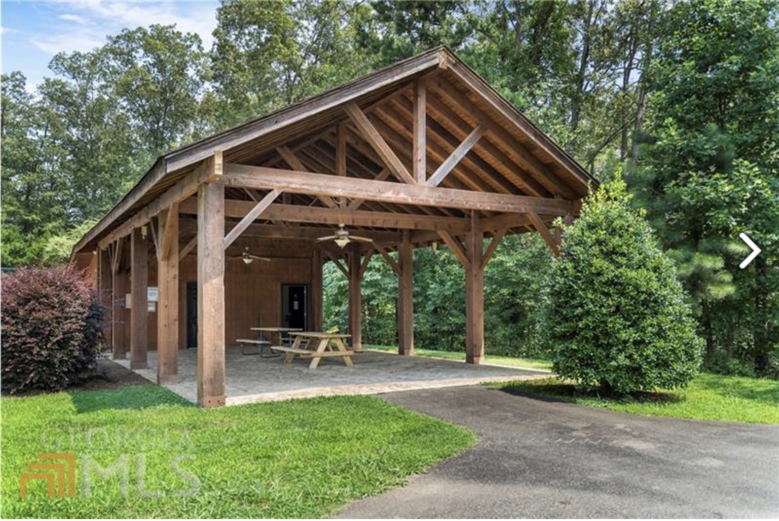 1401 Foxhound Trail Northeast Ranger, GA 30734 - Photo 17 of 34 a view of a chair and table in backyard of the house