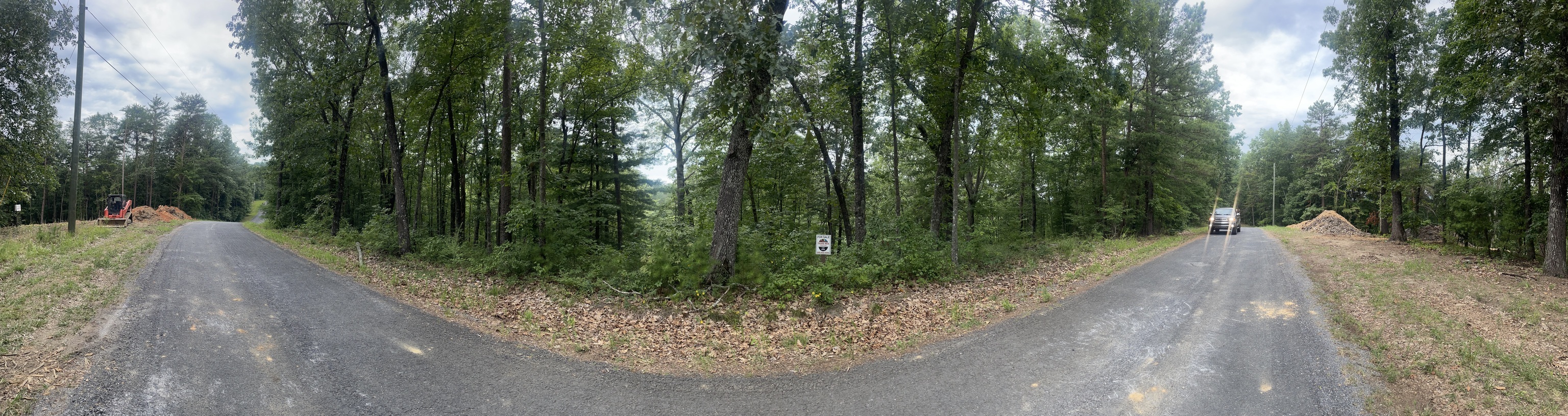 1401 Foxhound Trail Northeast Ranger, GA 30734 - Photo 4 of 34 a view of a street with a trees in the background