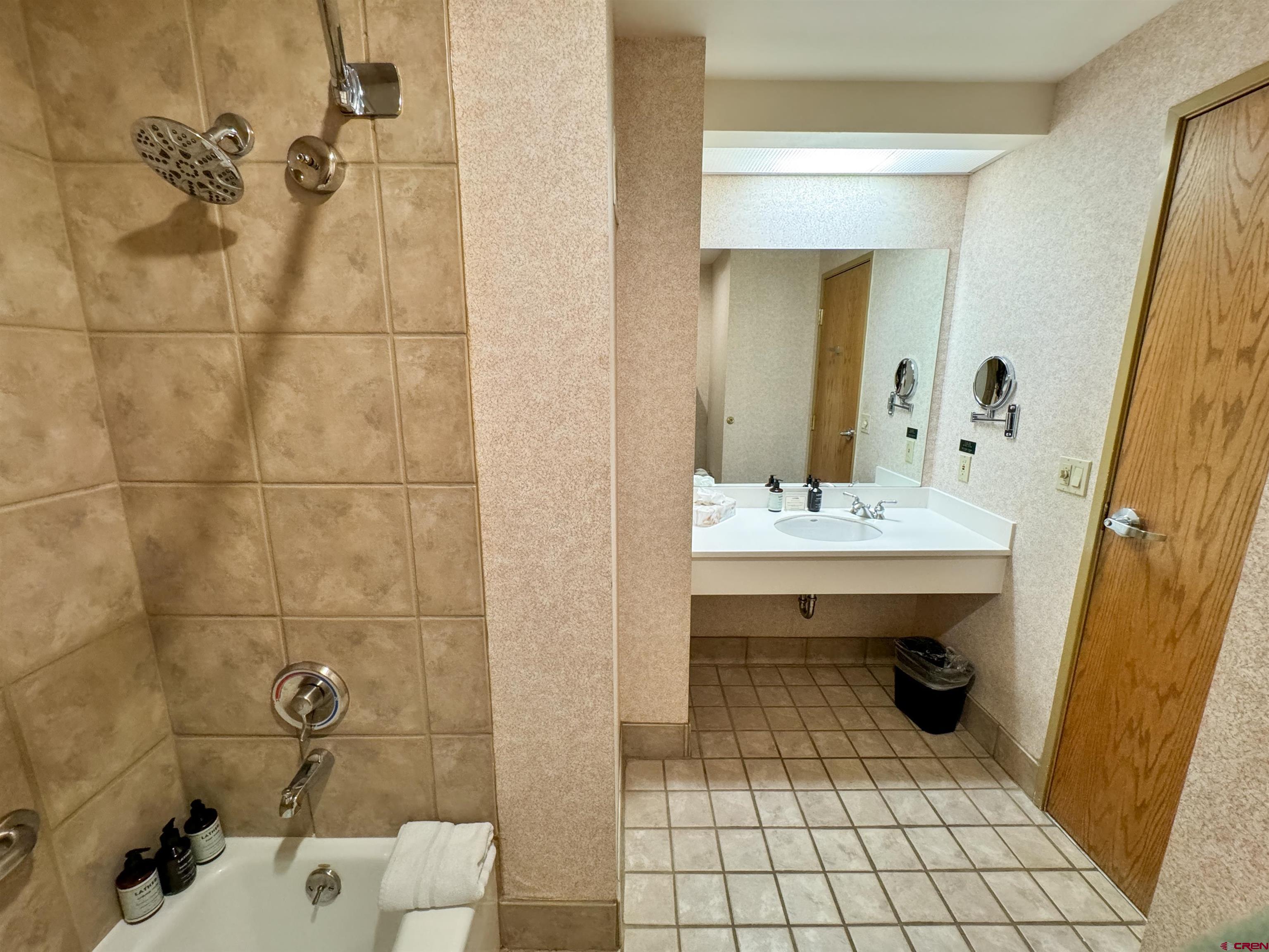 6 Emmons Road, Unit 181 Crested Butte, CO 81225 - Photo 11 of 25 a bathroom with a sink toilet and shower