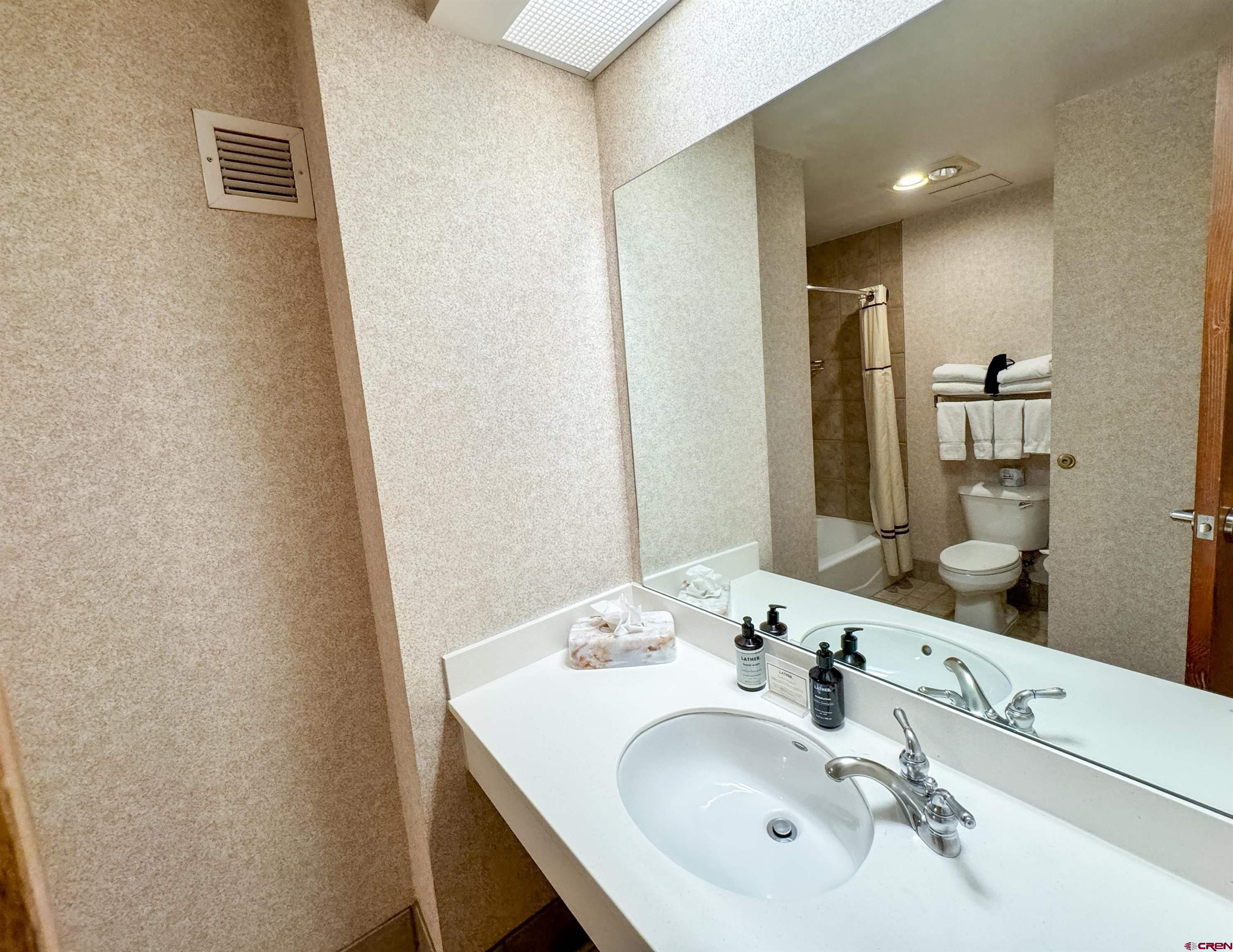 6 Emmons Road, Unit 181 Crested Butte, CO 81225 - Photo 12 of 25 a bathroom with a sink and a mirror