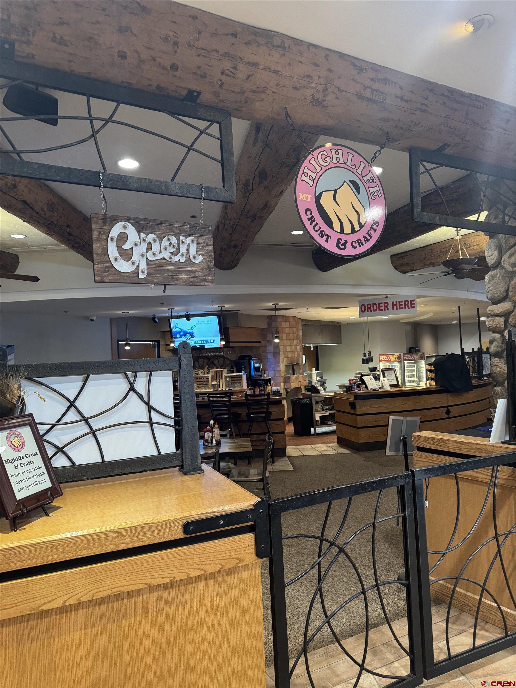6 Emmons Road, Unit 181 Crested Butte, CO 81225 - Photo 23 of 25 a kitchen with stainless steel appliances granite countertop a sink and cabinets