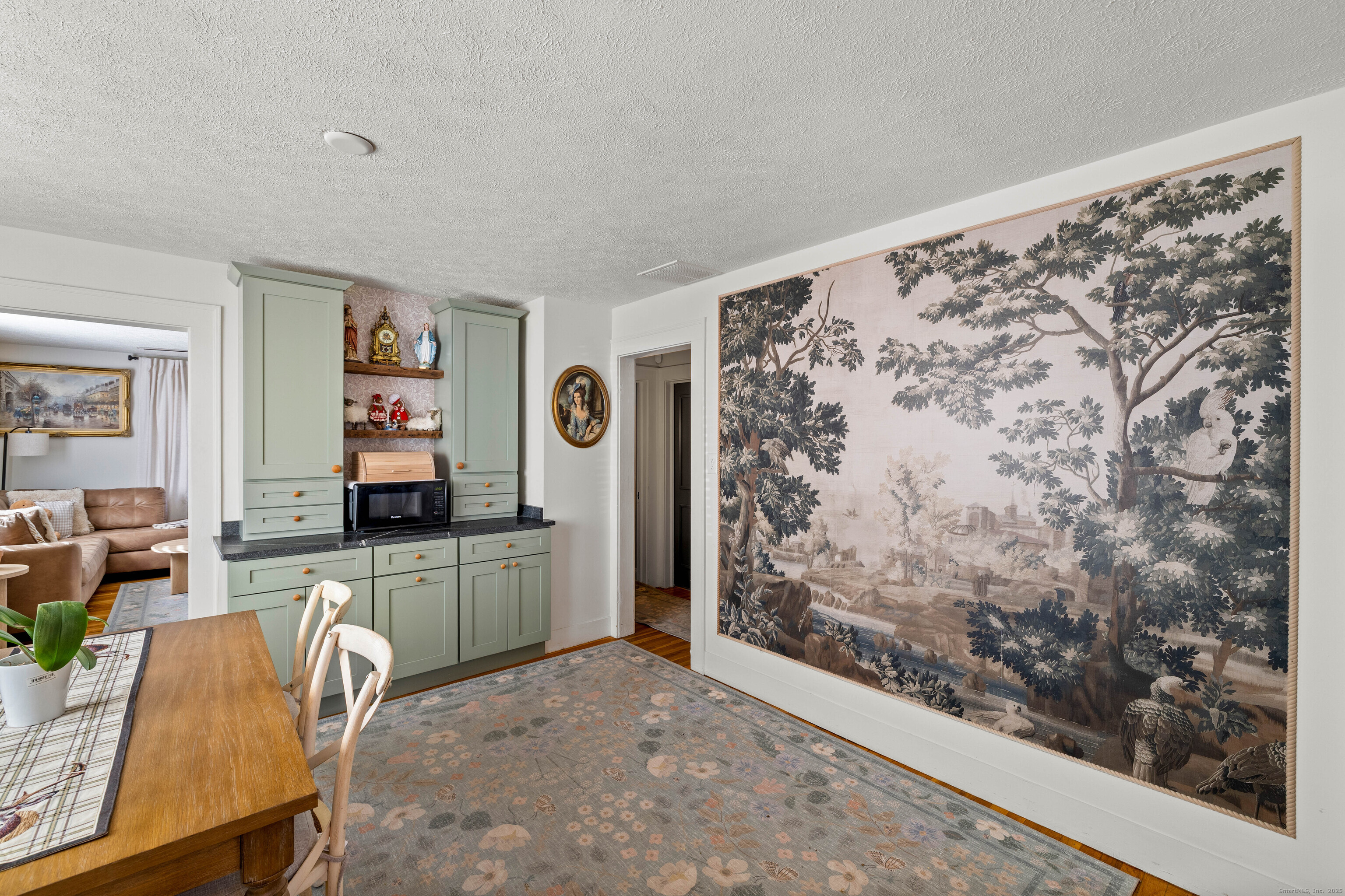 552 Laurel Hill Road Norwich, CT 06360 - Photo 12 of 40 a kitchen with a refrigerator and a stove top oven