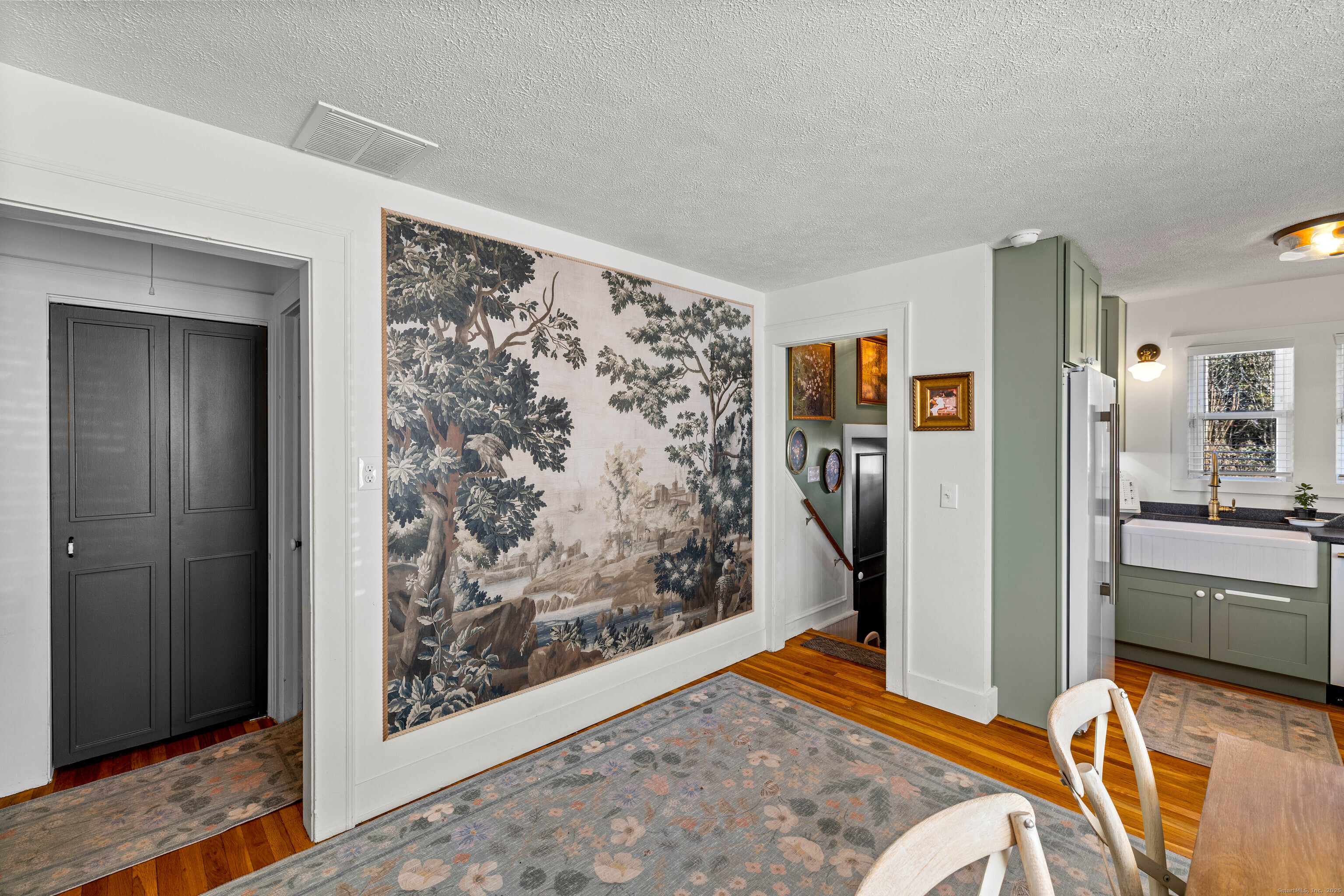 552 Laurel Hill Road Norwich, CT 06360 - Photo 20 of 40 a view of a livingroom with furniture and an entryway