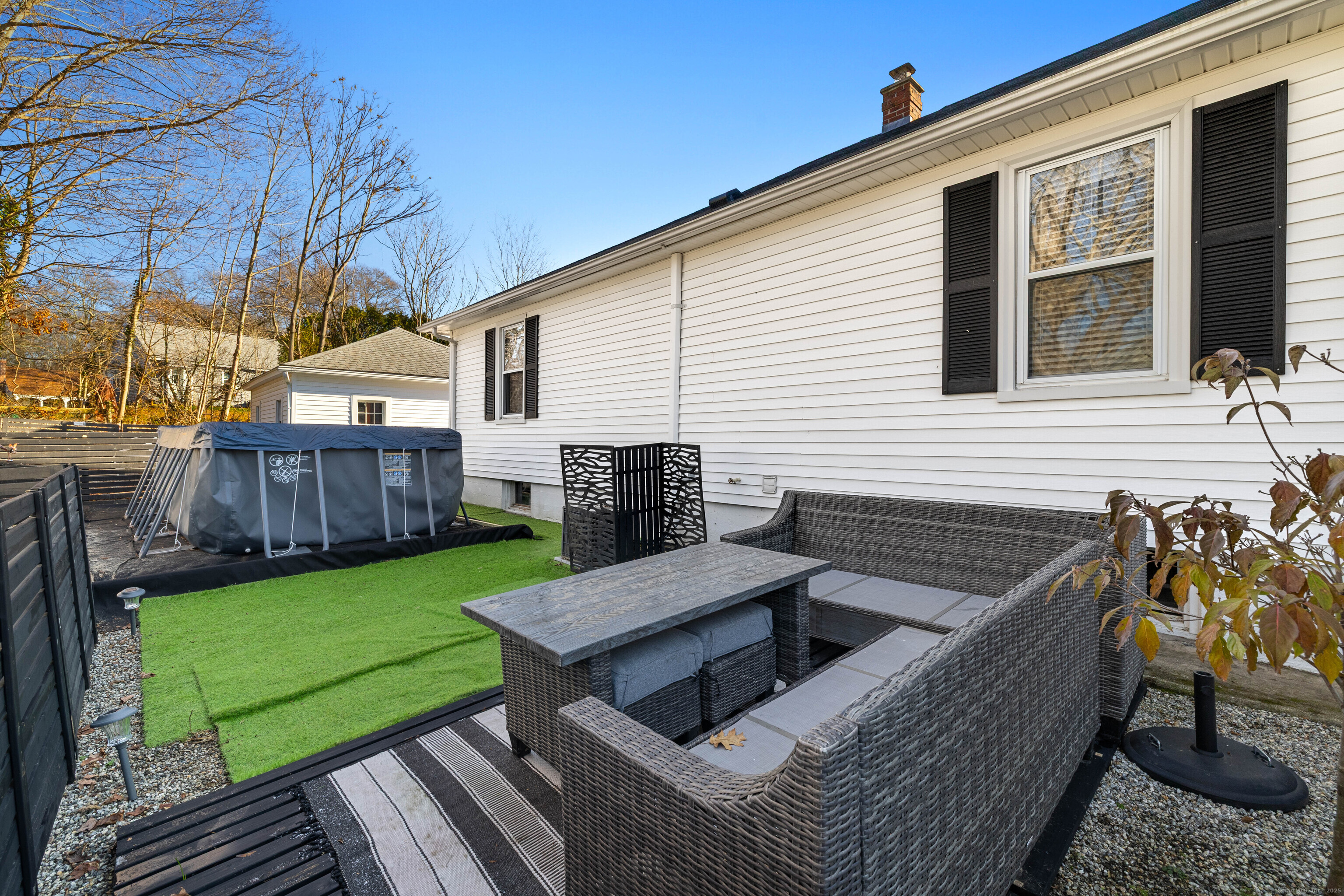 552 Laurel Hill Road Norwich, CT 06360 - Photo 38 of 40 a view of a deck with chairs