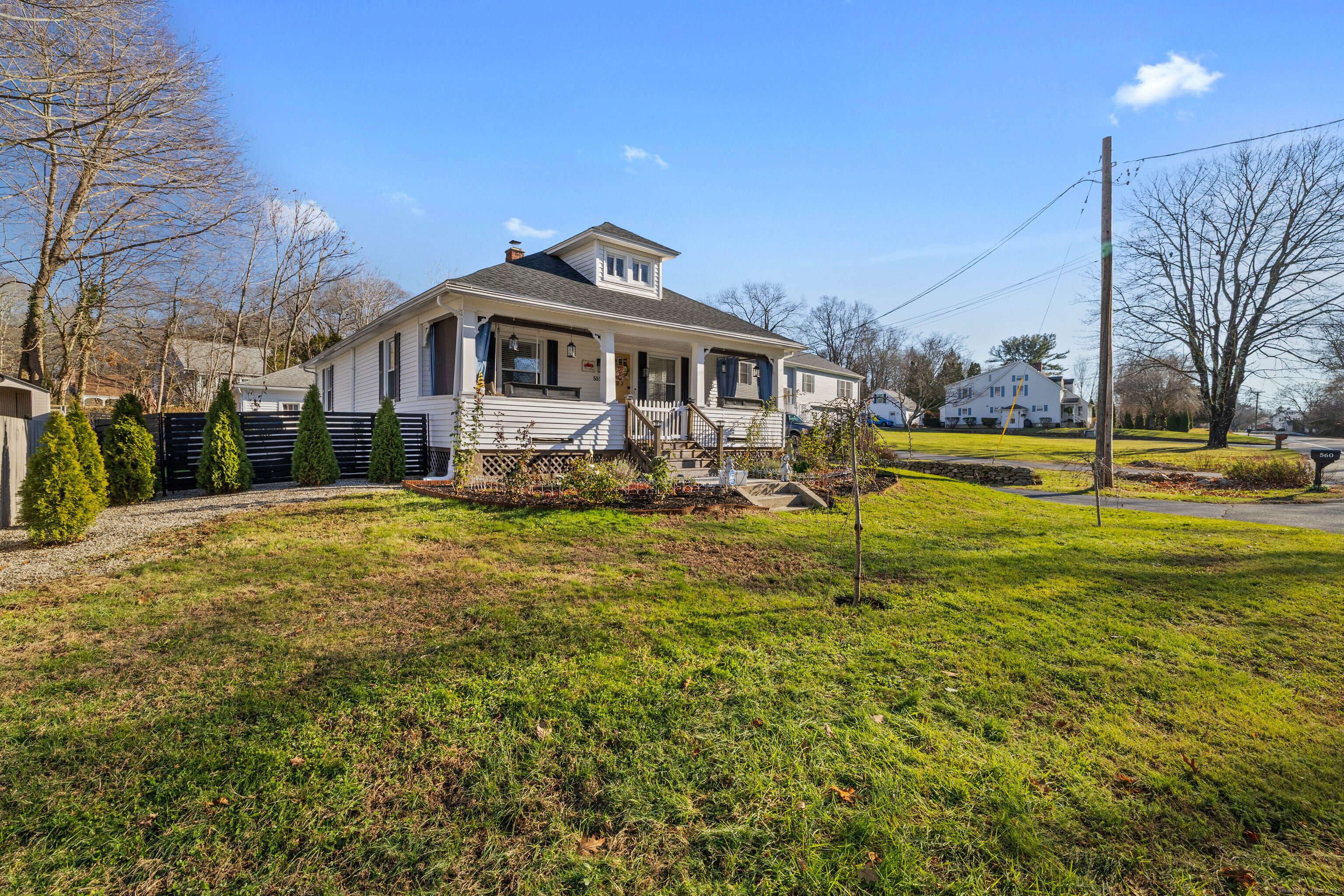 552 Laurel Hill Road Norwich, CT 06360 - Photo 39 of 40 a view of a house with a yard