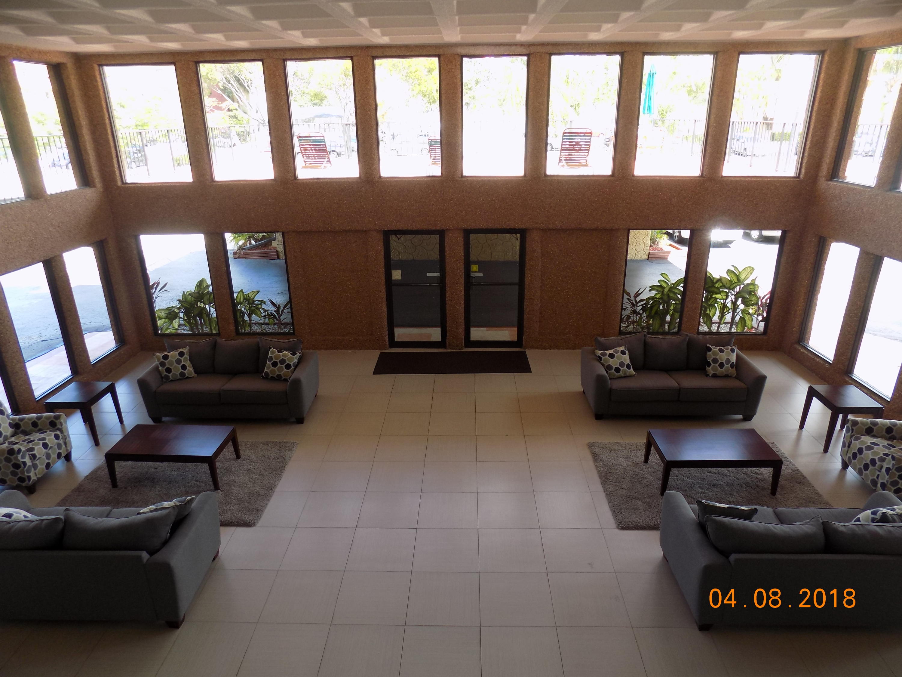 9440 Southwest 8th Street, Unit 221 Boca Raton, FL 33428 - Photo 5 of 20 ISLE 5 LOBBY DOWN VIEW