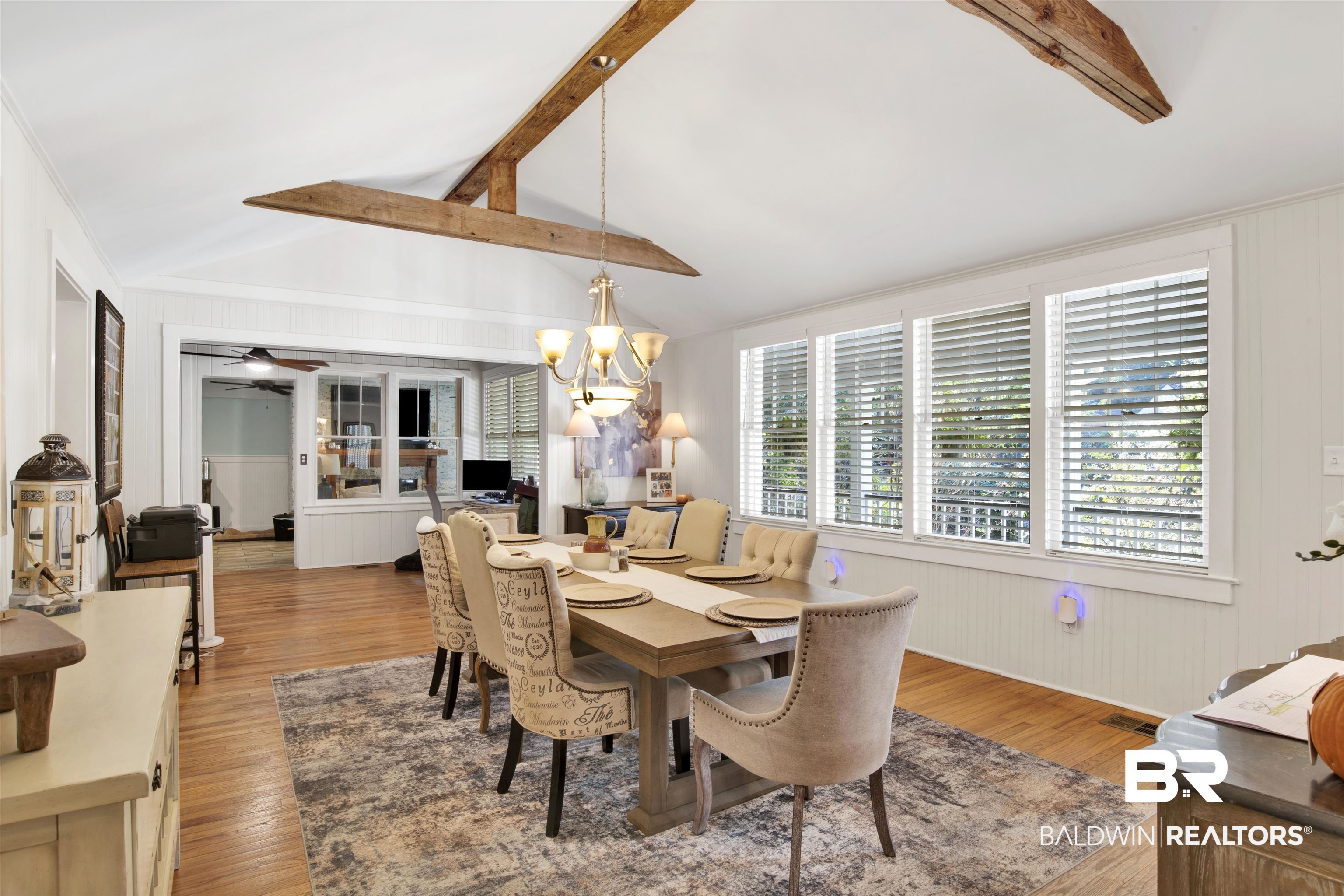 605 Van Avenue Daphne, AL 36526 - Photo 6 of 37 Dining room featuring vaulted ceiling with beams, hardwood / wood-style flooring, and ceiling fan with notable chandelier