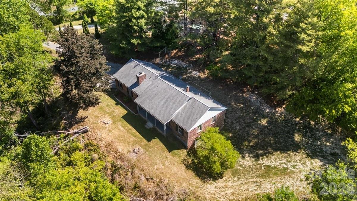 14 Jack Sullins Road Spruce Pine, NC 28777 - Photo 37 of 37 a view of house with a yard
