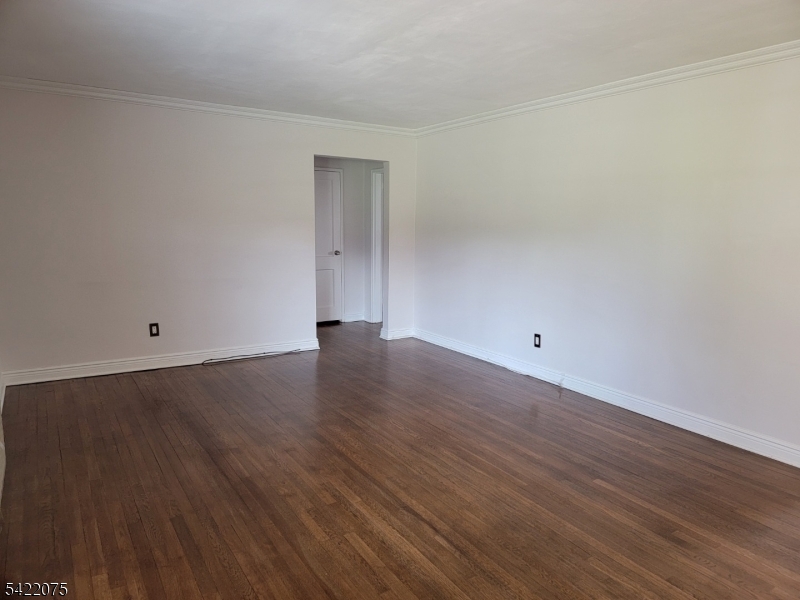 21C Troy Drive Springfield, NJ 07081 - Photo 9 of 17 wooden floor in a room