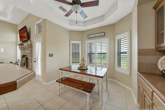 a bedroom with furniture and a window