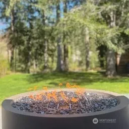 a view of a yard with a house