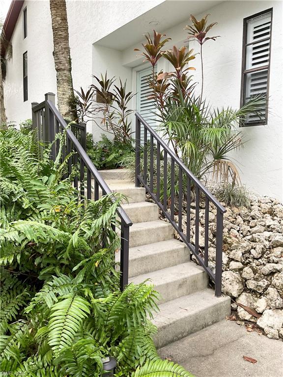 964 8th Avenue South, Unit B2 Naples, FL 34102 - Photo 2 of 37 a view of entryway with wooden floor