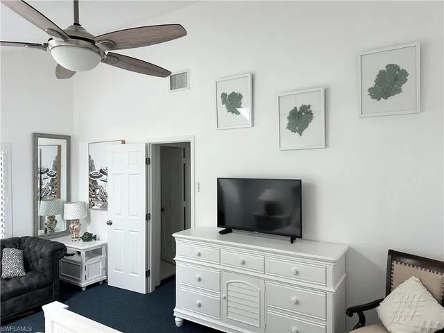 a bathroom with a shower and a window
