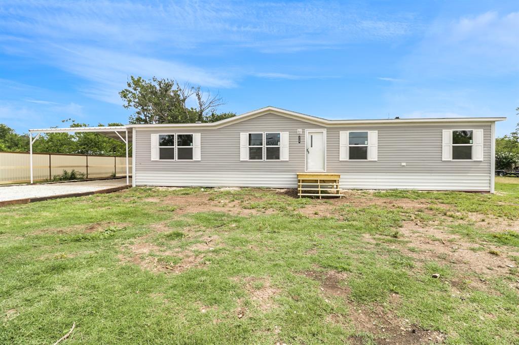 708 West 8th Street Coleman, TX 76834 - Photo 1 of 25 a house view with a garden space